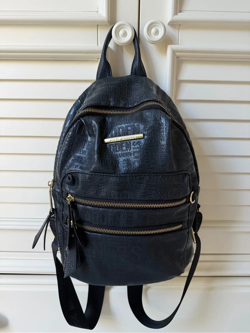 Steve Madden Black Embossed Mini Backpack with Gold Zippers